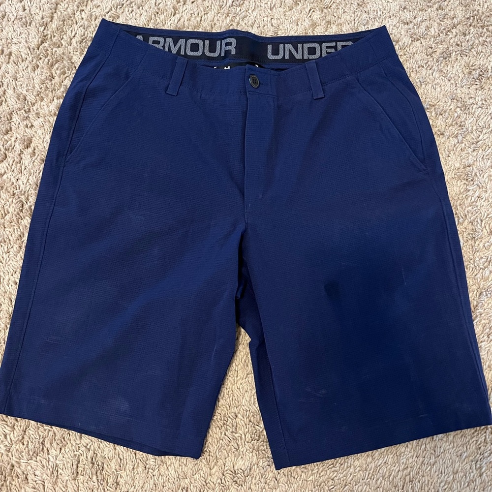 Under Armour heat gear mens button fly shorts 
Size 34